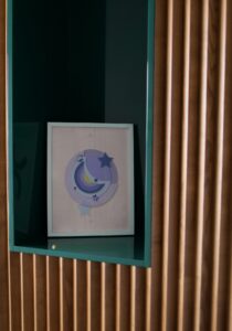blue moon poster in white frame