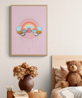 Pink rainbow framed poster in a cute kids bedroom
