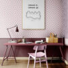 comme ci comme ca poster in artists-studio-with-a-large-work-bench