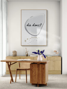 dis donc framed poster in home-office-with-a-long-wooden-cabinet