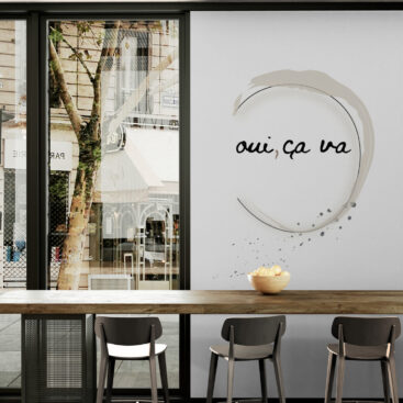 oui-ca-va-wallart-in-city-cafe-with-window-views-
