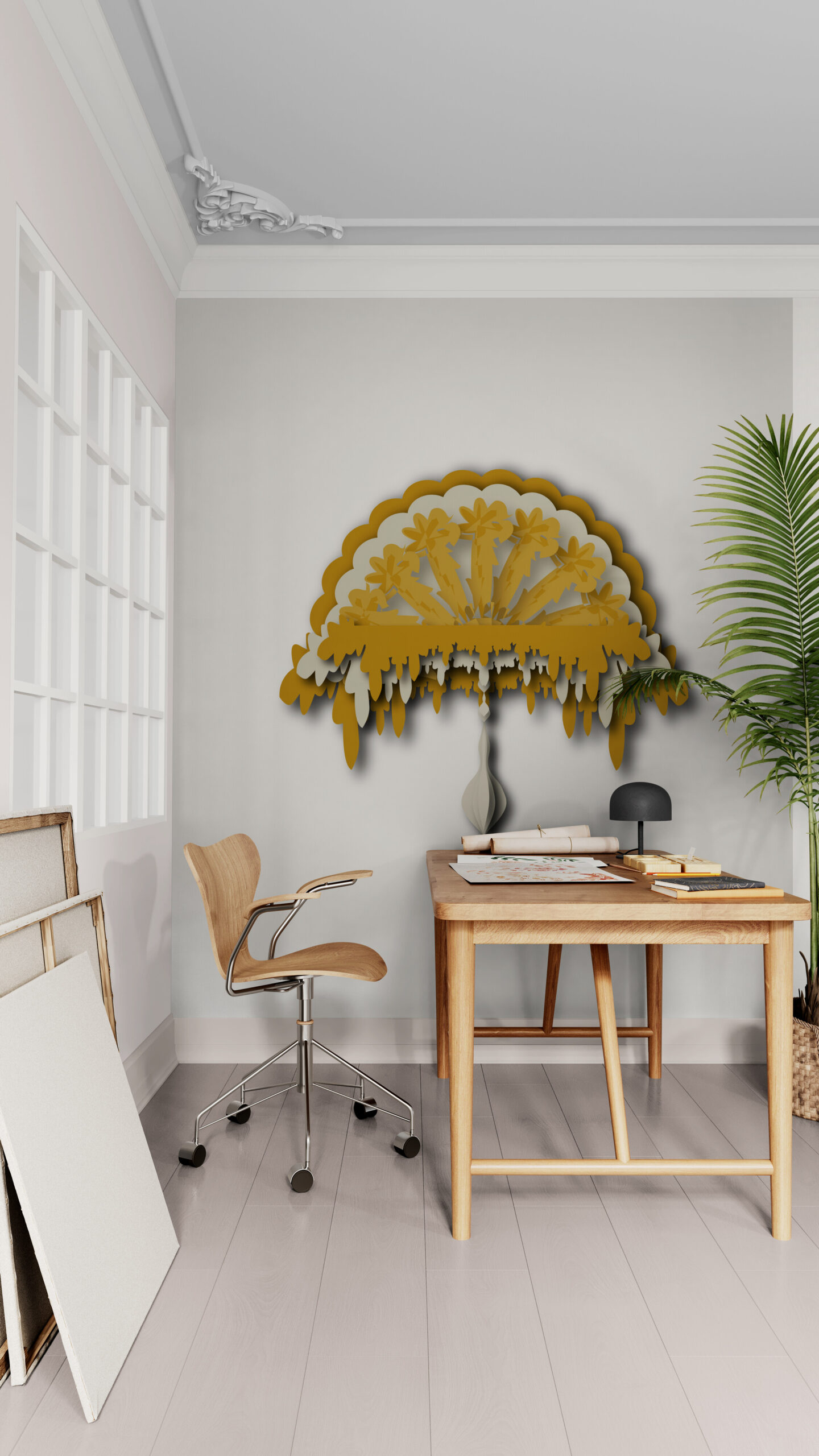 orange ornamental wall art in artists-studio-with-large-tropical-plant