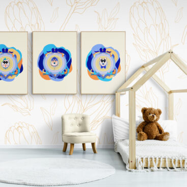 Colorful superhero cat posters in a cozy toddler's room. The central poster features a determined Superbrother Cat. Flanking Superbrother Cat are playful posters of Supersister Cat and Superdad Cat in yellow. The posters hang on a striped wall above a colorful toy box in a child's bedroom.