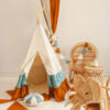 Circus Teepee with Frills and circus mats and rattan furniture