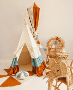 Circus Teepee with Frills and circus mats and rattan furniture