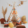 Teepee Indian Vibe sits creatively in a vibrant and colourful kids room