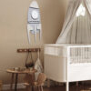 the rocket wall decor for kids room in a nursery