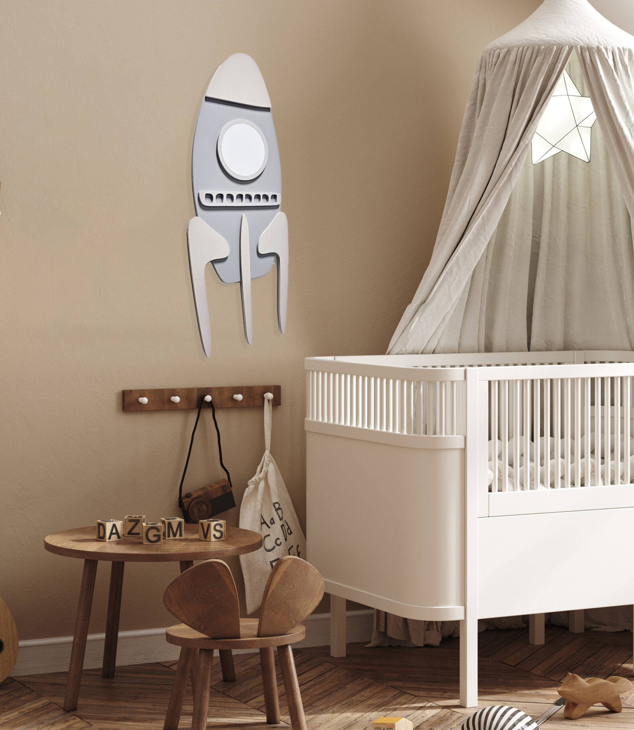 the rocket wall decor for kids room in a nursery