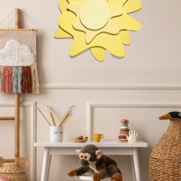 Yellow Star Wall decor in cute and fun kids interior with desk