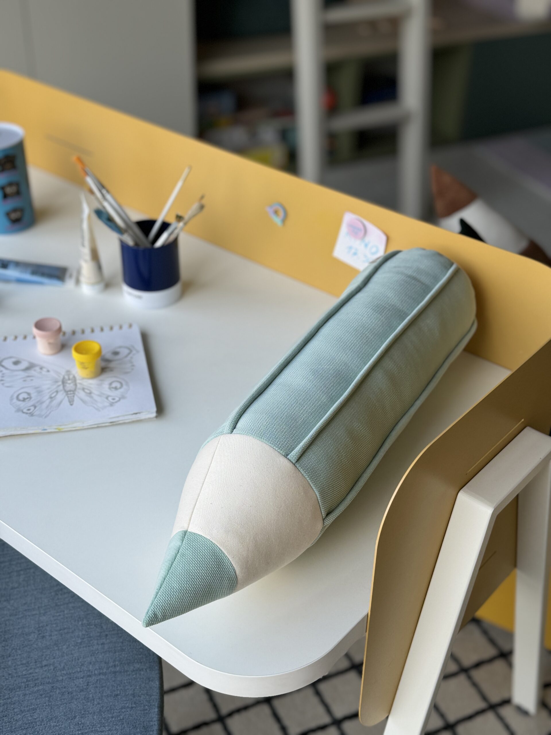 Crayons Pillows Mint on the kids working desk