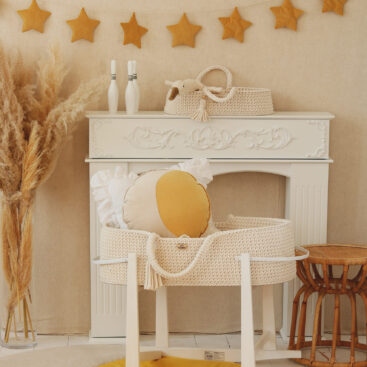 Velvet moon pillow yellow and beige, with blue moon floor mat in a yellow and beige room