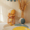 Velvet moon pillow blue and beige, and yellow and white with blue moon floor mat and yellow moon floor mat