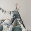 night sky teepee tent in dark navy with grey cloud pillow and white shell pillow and grey leaf mat