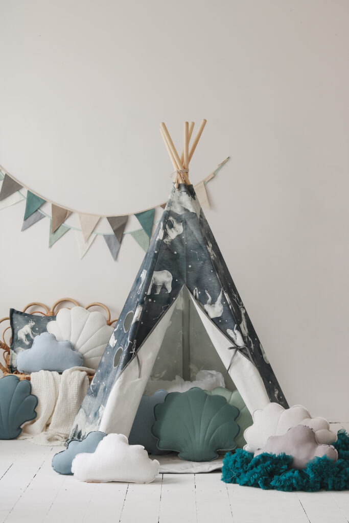 night sky teepee tent in dark navy with grey cloud pillow and white shell pillow and grey leaf mat