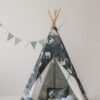 night sky teepee tent in dark navy with grey cloud pillow and white shell pillow and grey leaf mat