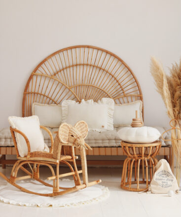 Velvet Pillow with Frills – White in neutral, beige space with wicker furniture