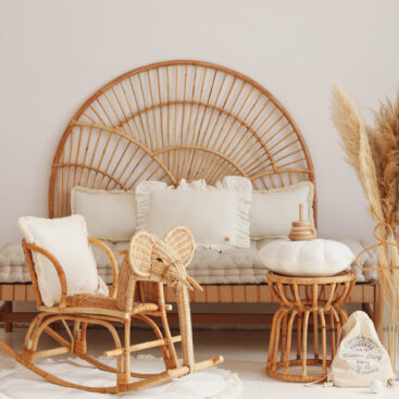 Velvet Pillow with Frills – White in neutral, beige space with wicker furniture