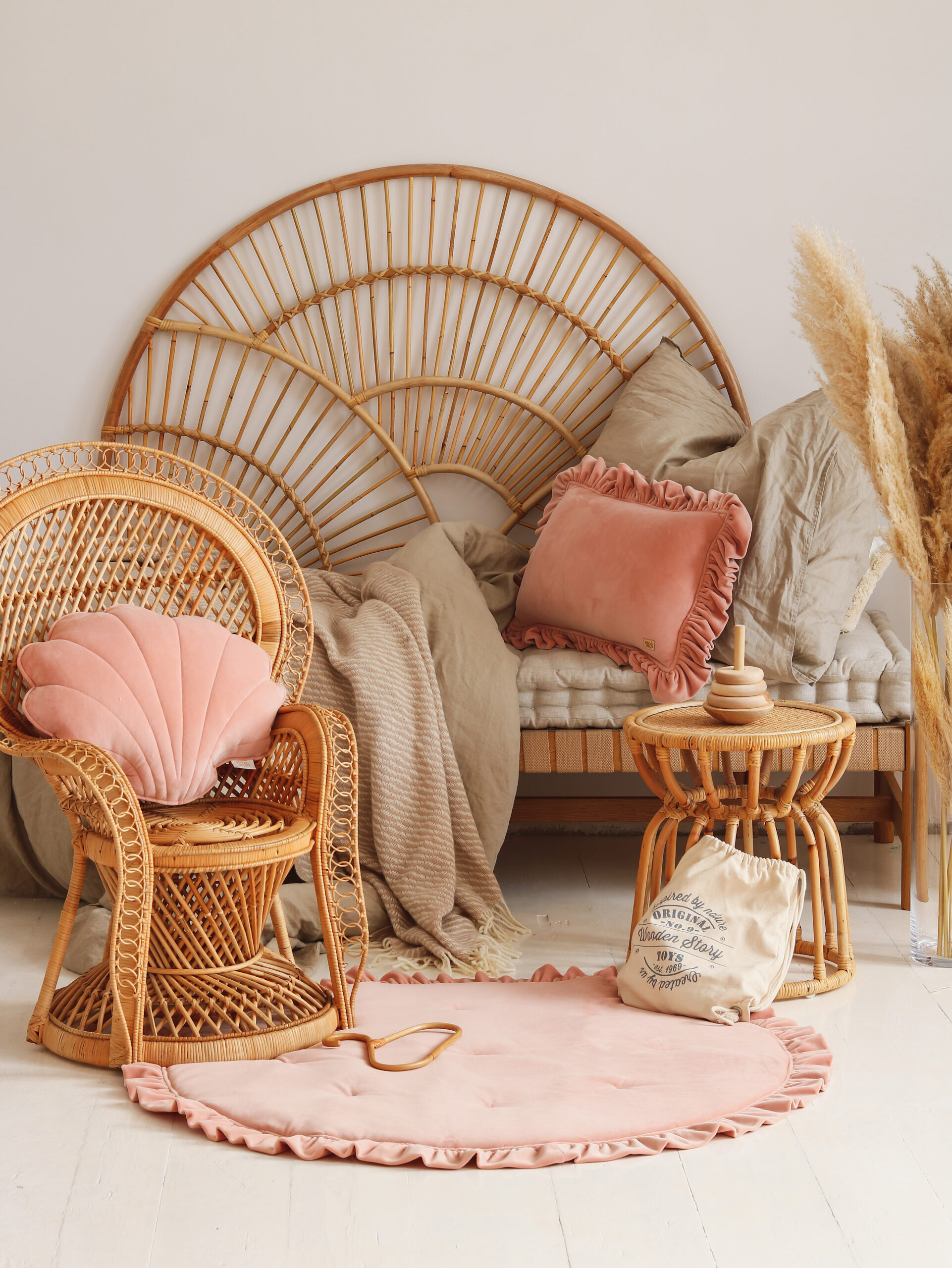 Velvet Pillow with Frills – April in beige space with wicker furniture