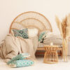 Velvet Pillow with Frills – White in neutral, beige space with mint accents and wicker furniture