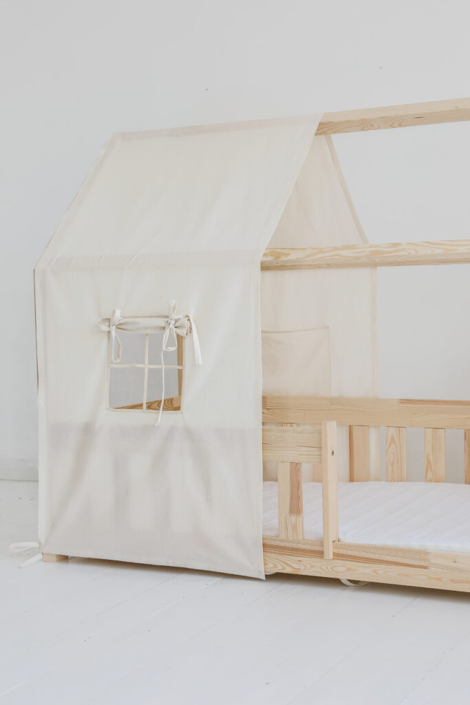 raw cotton bed canopy over house bed, neutral and raw