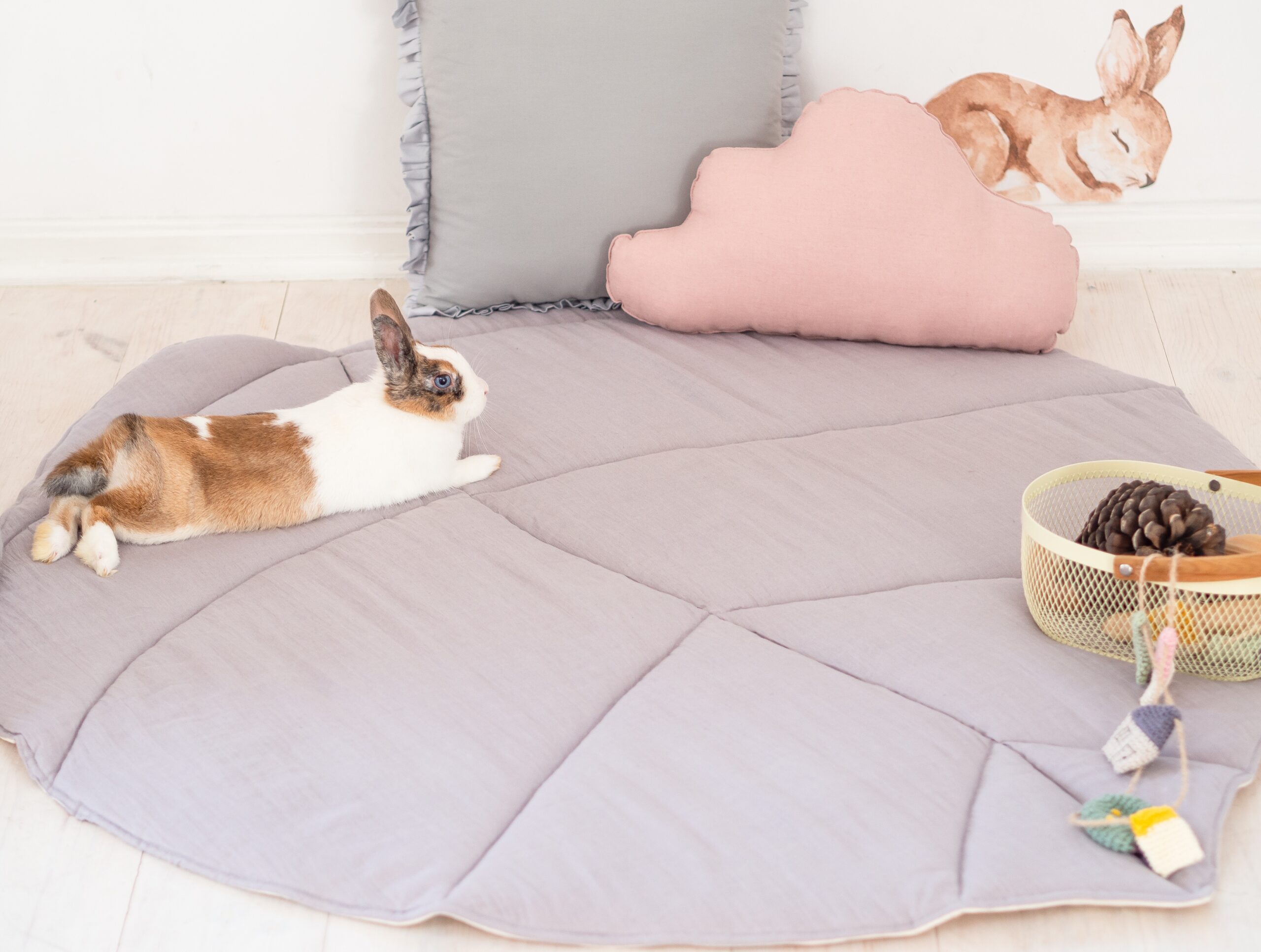 big padded, soft and comfy playmat in girl's room with a bunny