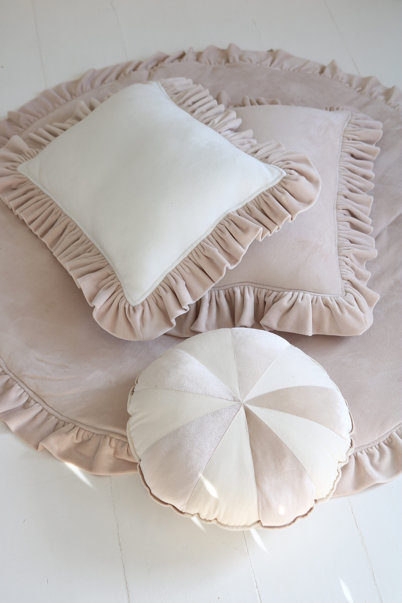 soft velvet round mat with frills latte with latte square pillow with frills and round beige pillow