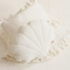 white velvet shell pillow and white frilled square pillow