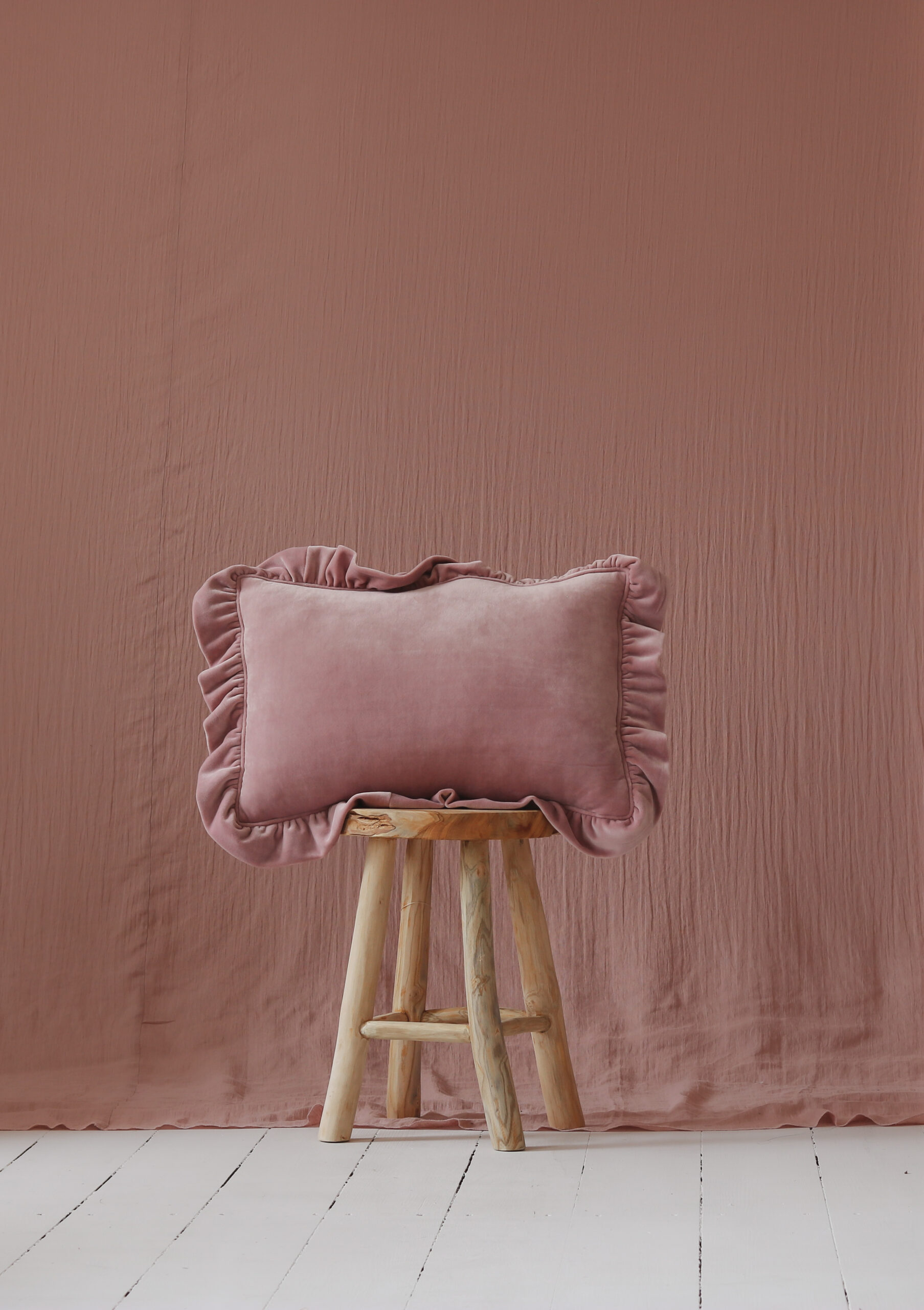 pink velvet pillow with frills