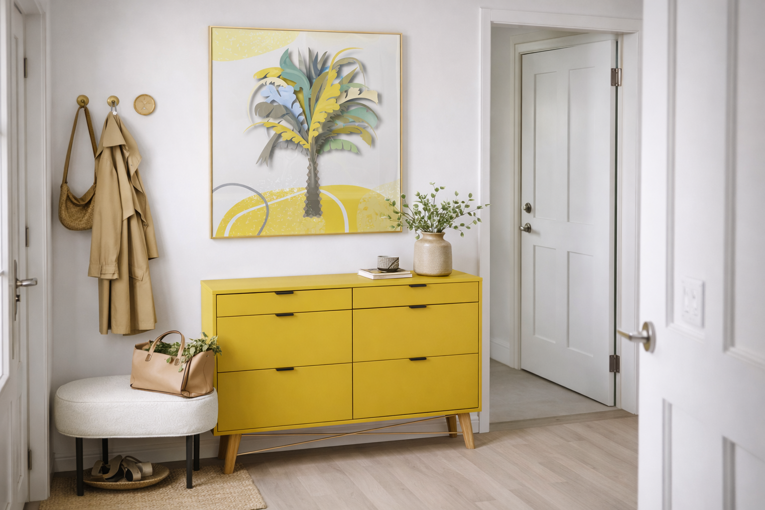 home entry space with yellow narrow console and yellow palm tree artwork